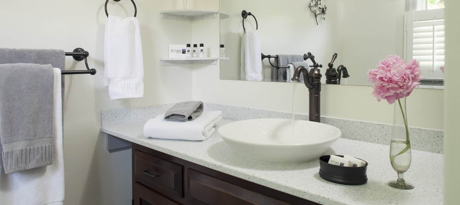 Large vanity with vessel sink