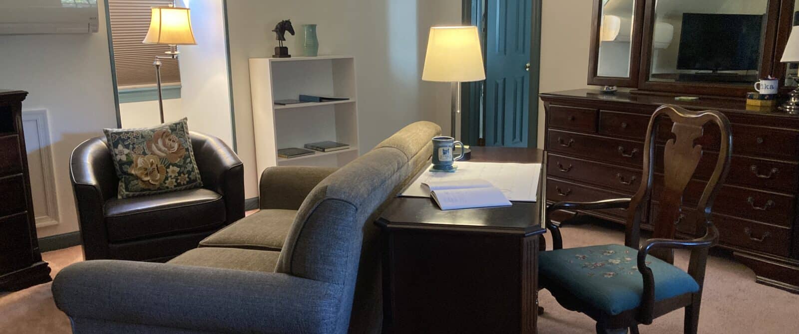 Desk and love seat in Walnut room